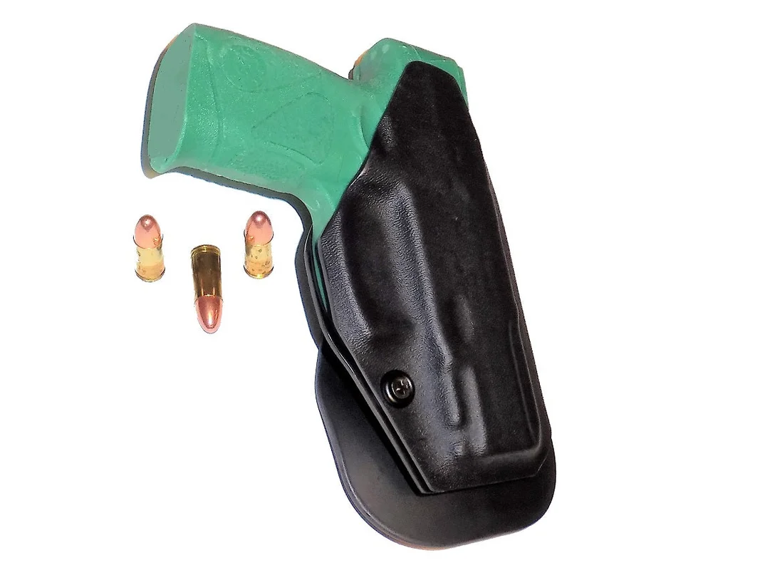 Aggressive Concealment outside the waistband paddle holster for Taurus