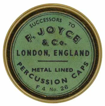 Cap box, 1-3/4" diameter, empty, with antique style label marked, F. Joyce & Co London England Metal Lined Percusison Caps F4 No. 26